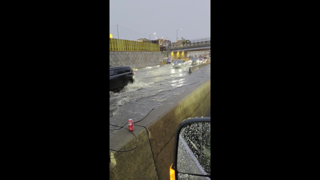 Flash flooding traps cars on flooded New York City highway