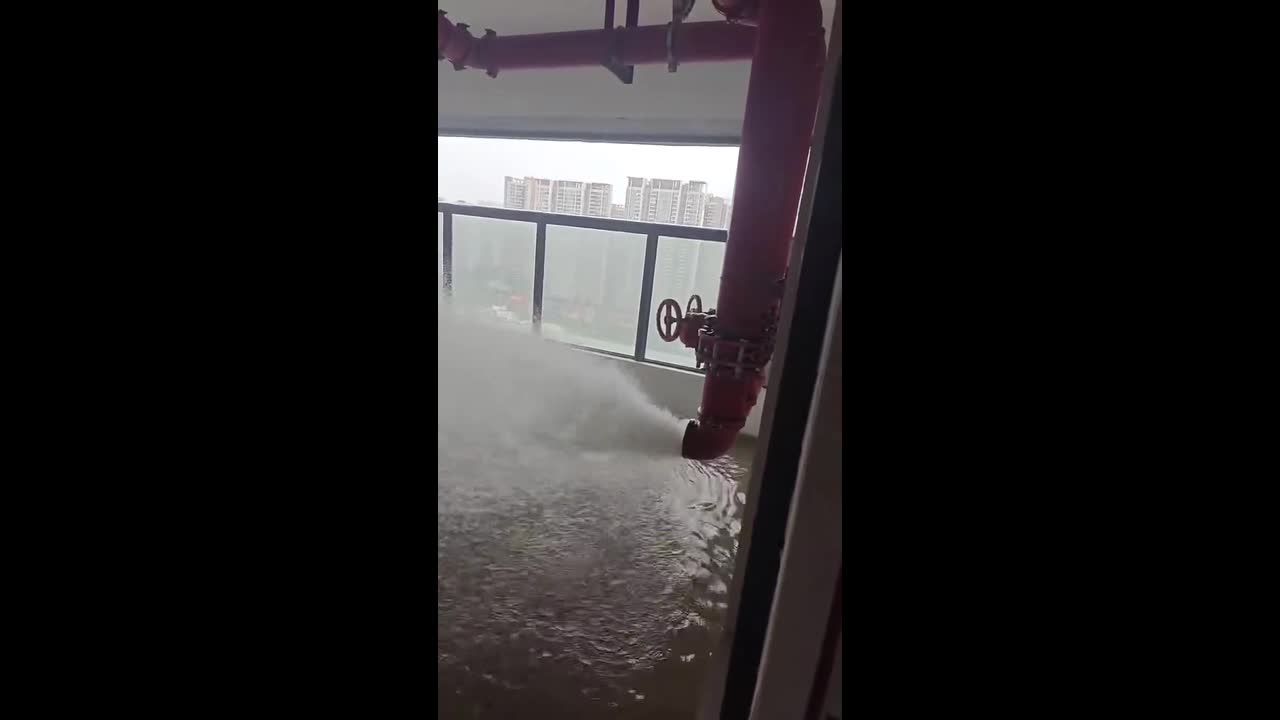 Burst fire pipe floods high-rise building in Guangdong, China