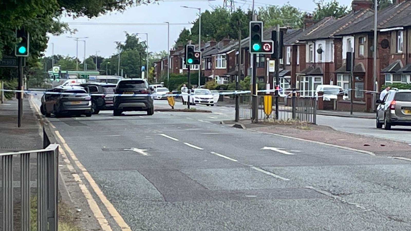 Man shot after car 'driven at' officers, say police