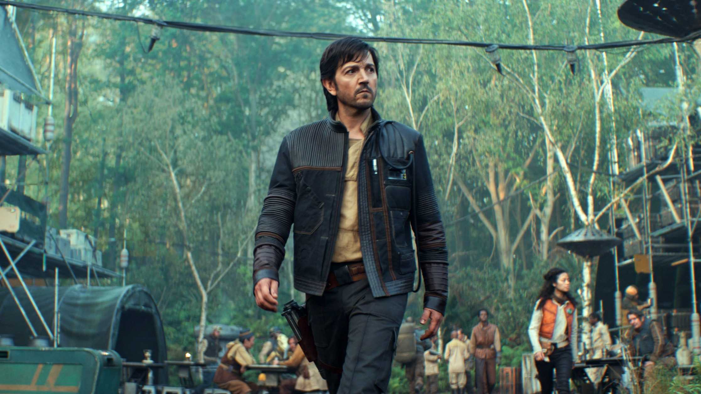 Cassian Andor walking through Yavin 4 in Andor