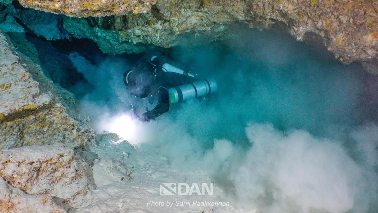A member of the diving team searching for the bodies of the Italian divers