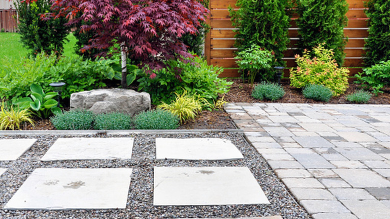 View of Use old baking molds to create budget-friendly pavers with this clever DIY
