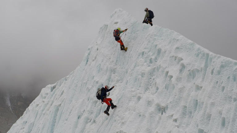A record 274 climbers scale Mount Everest in a single day