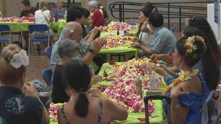 Volunteers gather for annual 'Sew a lei for Memorial Day' event