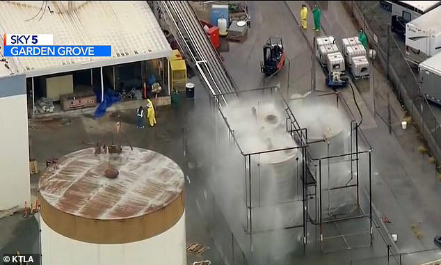 Panic as tens of thousands evacuated over fears that huge chemical tank ...