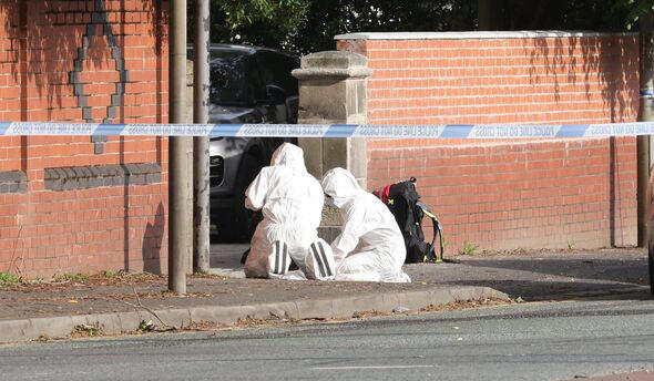 Armed police swarm Bury as man shot after 'driving at officers' in ...
