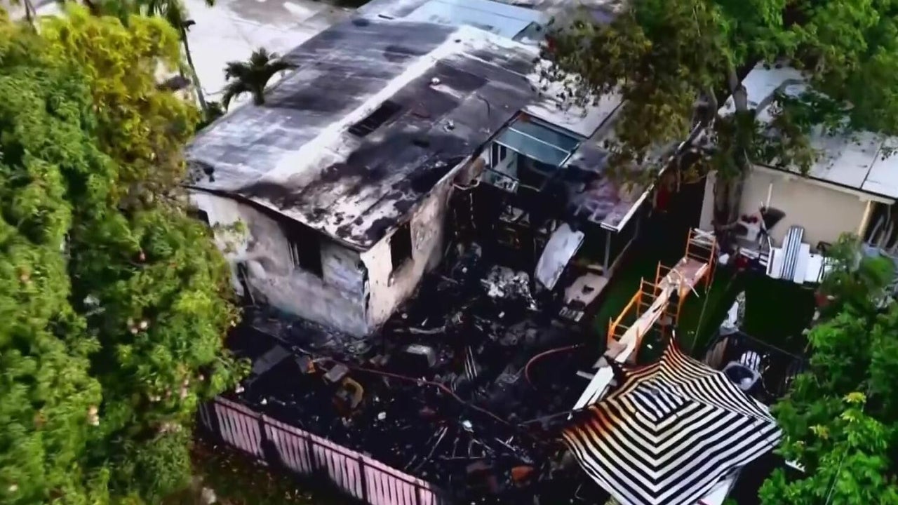 RV fire spreads to home near Opa-locka causing significant damage