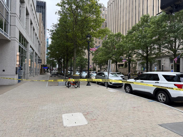 Woman charged with attempted murder after 2 attorneys shot outside ...