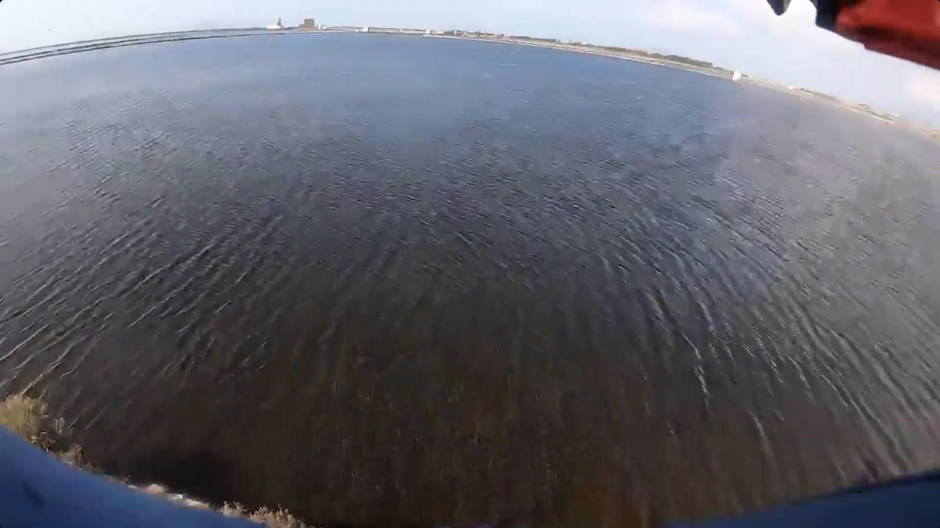 Kite surfer crashes into sea wall rocks