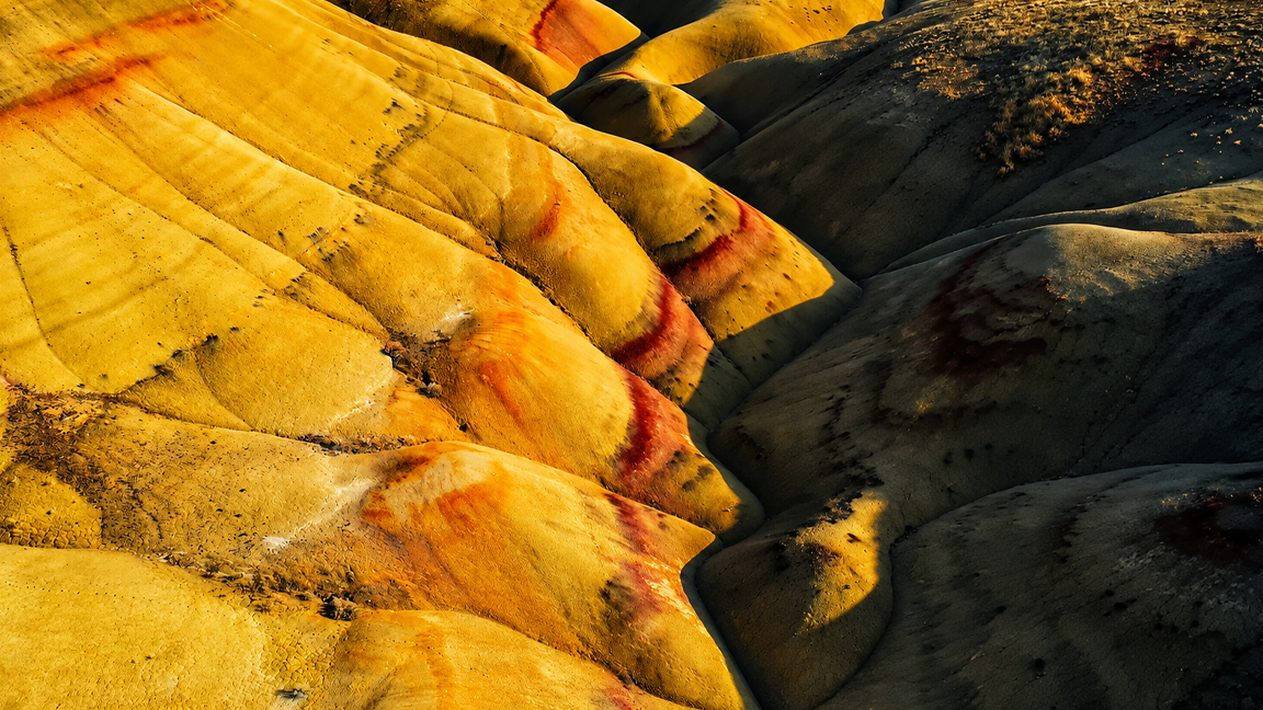 dramatic-geological-formations-with-vibrant-earth-layers