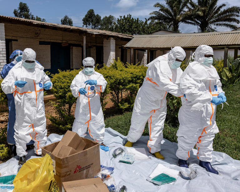 Health workers wearing protective equipment at a hospital in Mongbwalu, in the Democratic Republic of Congo, on Thursday. Photograph: Michel Lunanga/Getty Images