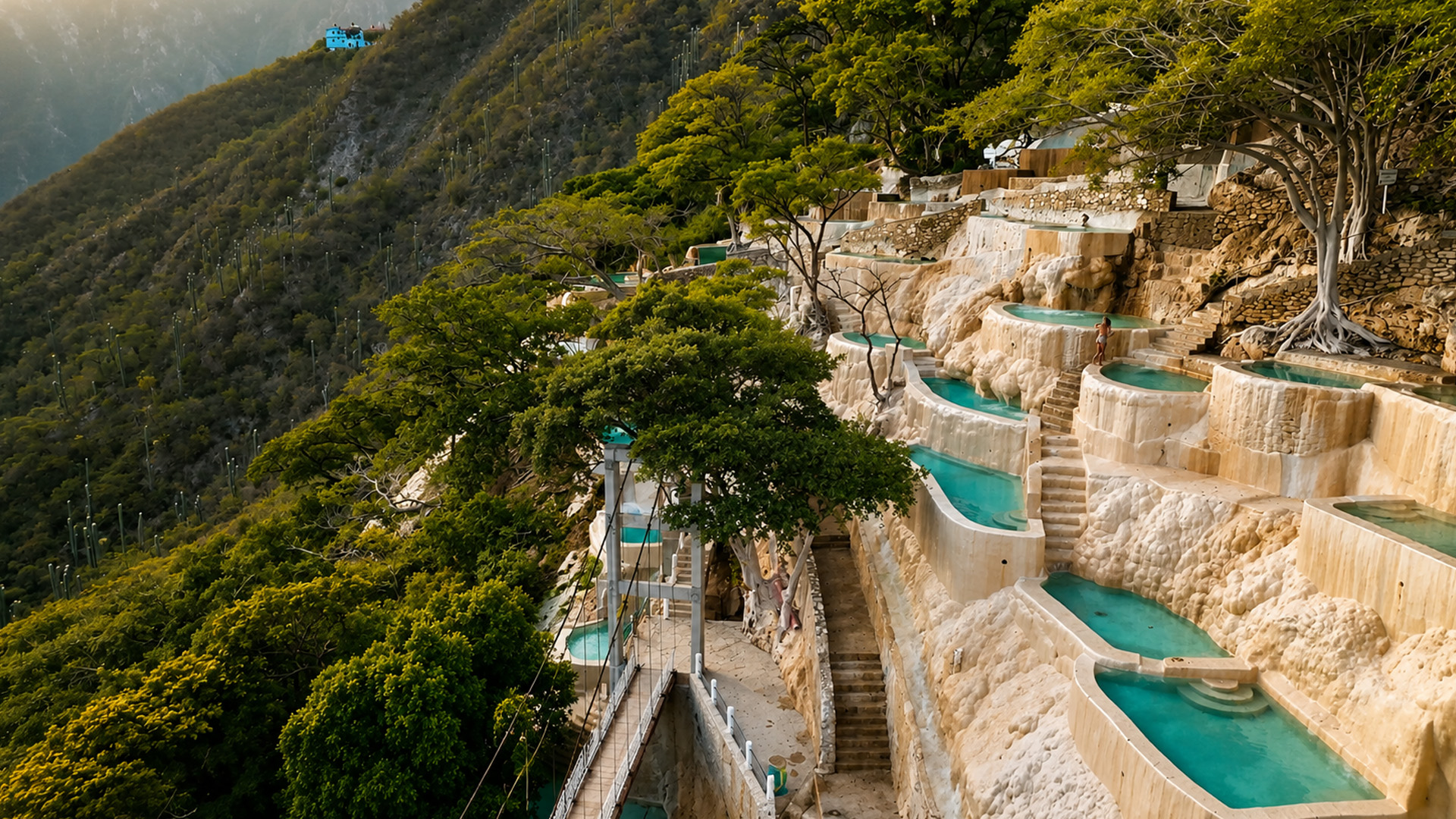 Natural hot springs carved into a mountain slope