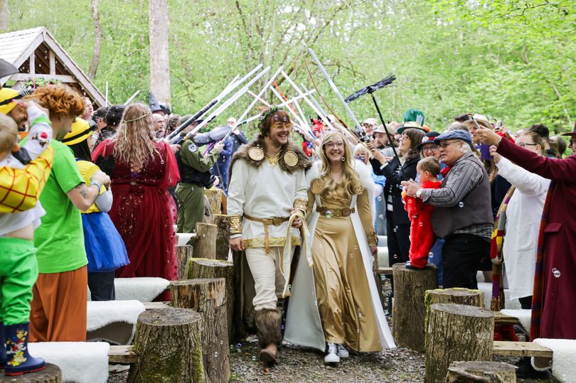 Couple celebrate epic Star Wars-themed wedding with film star guest and lightsaber rings