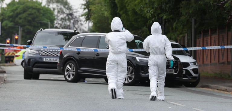 Man shot by police after car driven directly at officers during getaway ...