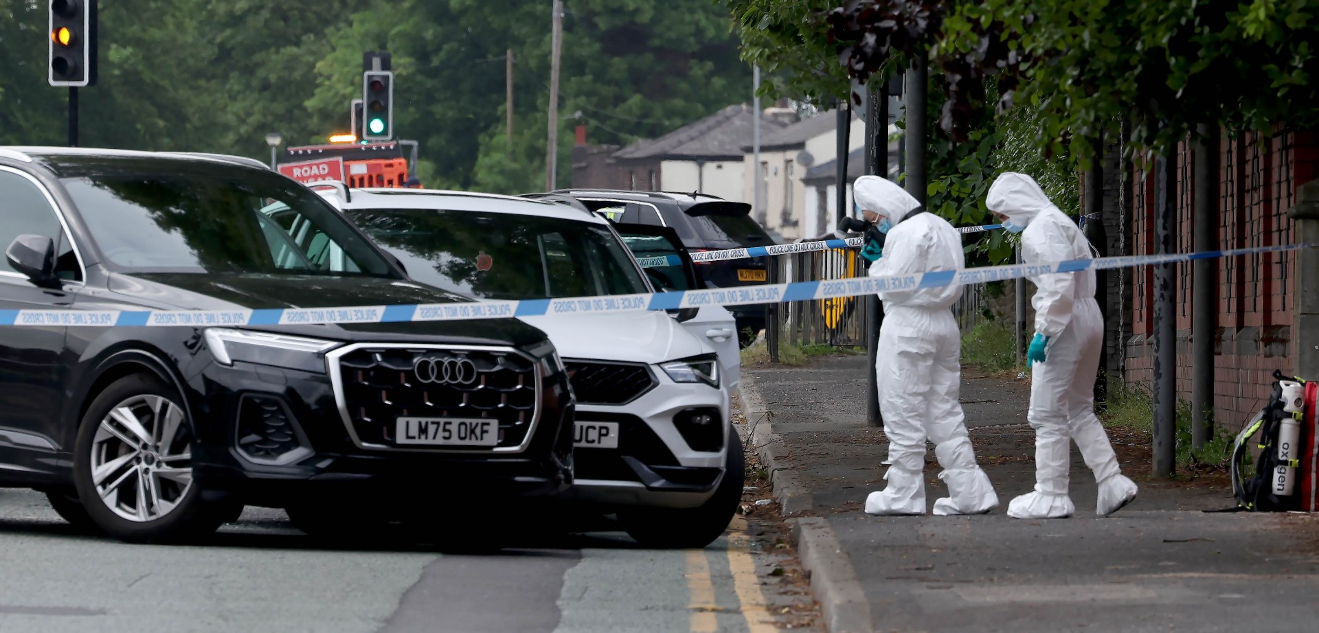 Man shot by police after car driven directly at officers during getaway ...