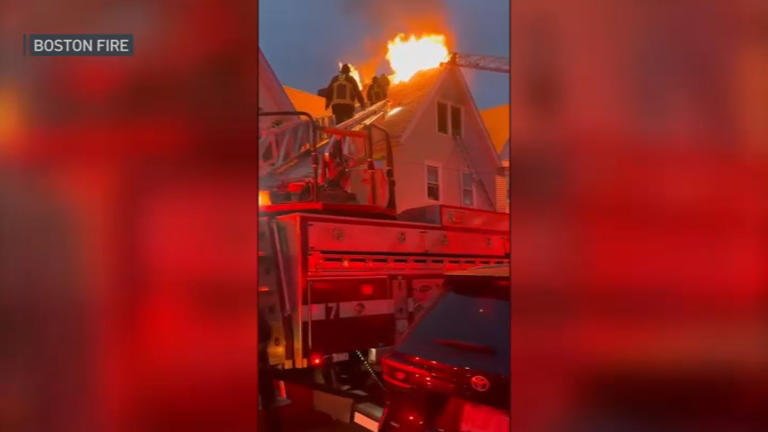 Firefighter taken to hospital after large fire in Dorchester