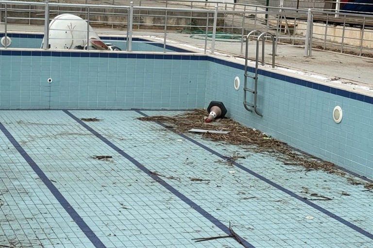 Family's dream holiday descends into chaos after arriving to fenced-off ...