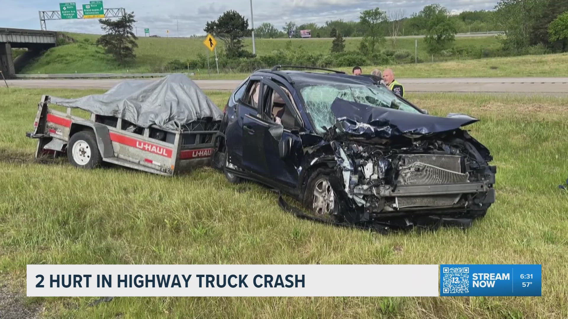 2 hurt after truck crashes through guard rails, hits vehicle on NB US-131