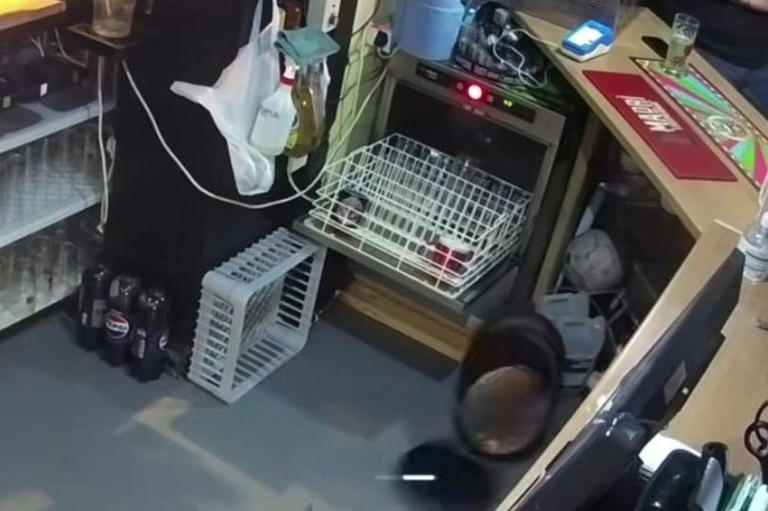 Moment 'bored' pub ghost 'pranks' staff by chucking signs around and ...