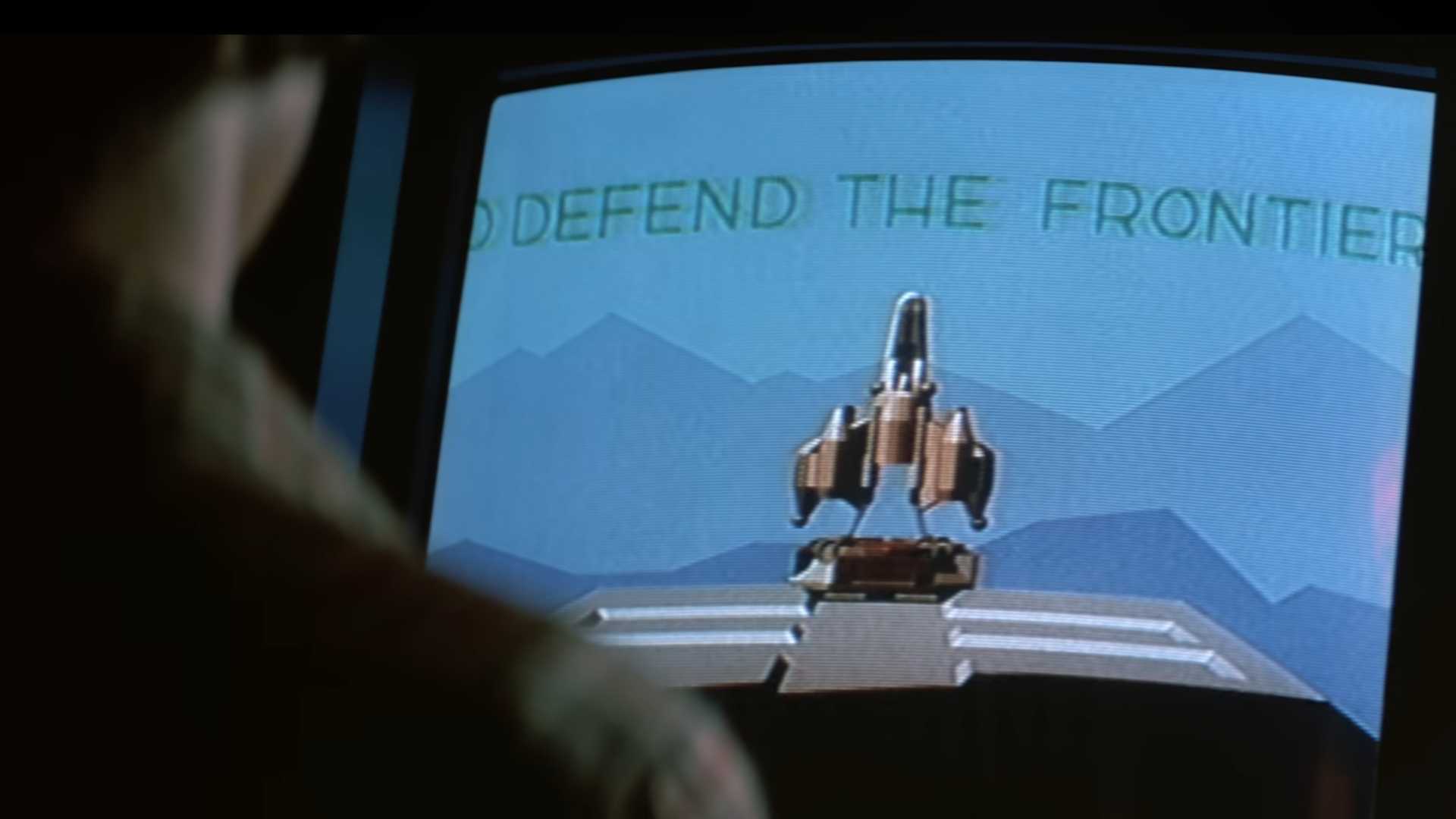Alex playing the Starfighter arcade game in the last starfighter