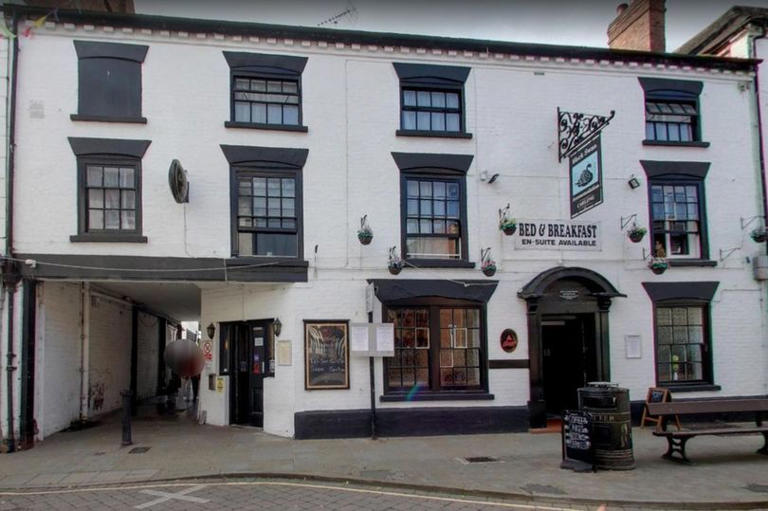 Moment 'bored' pub ghost 'pranks' staff by chucking signs around and ...