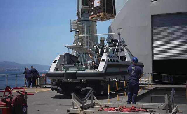 Britain's navy prepares to clear mines in Strait of Hormuz while ...