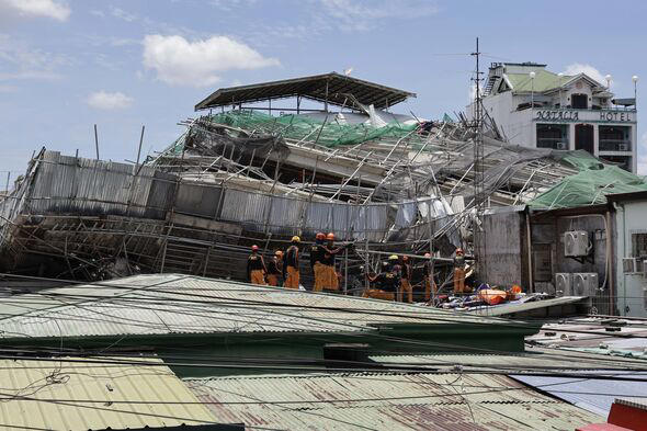 23 people feared trapped as nine-storey building collapses in Philippines