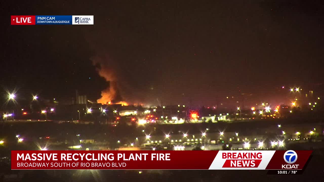 Firefighters are at the scene of a large recycling plant fire