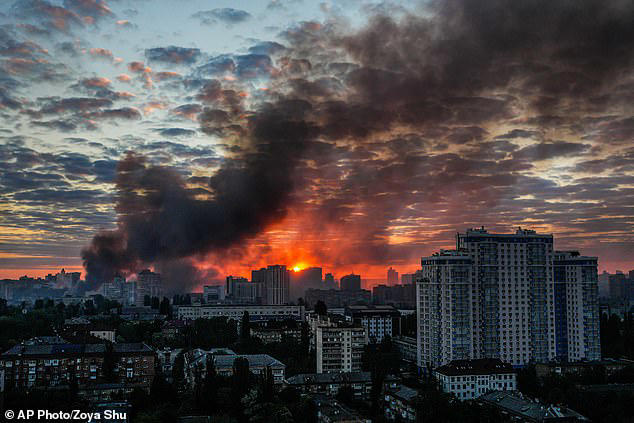 Smoke rises over the Kyiv skyline following a series of Russian missile strikes.