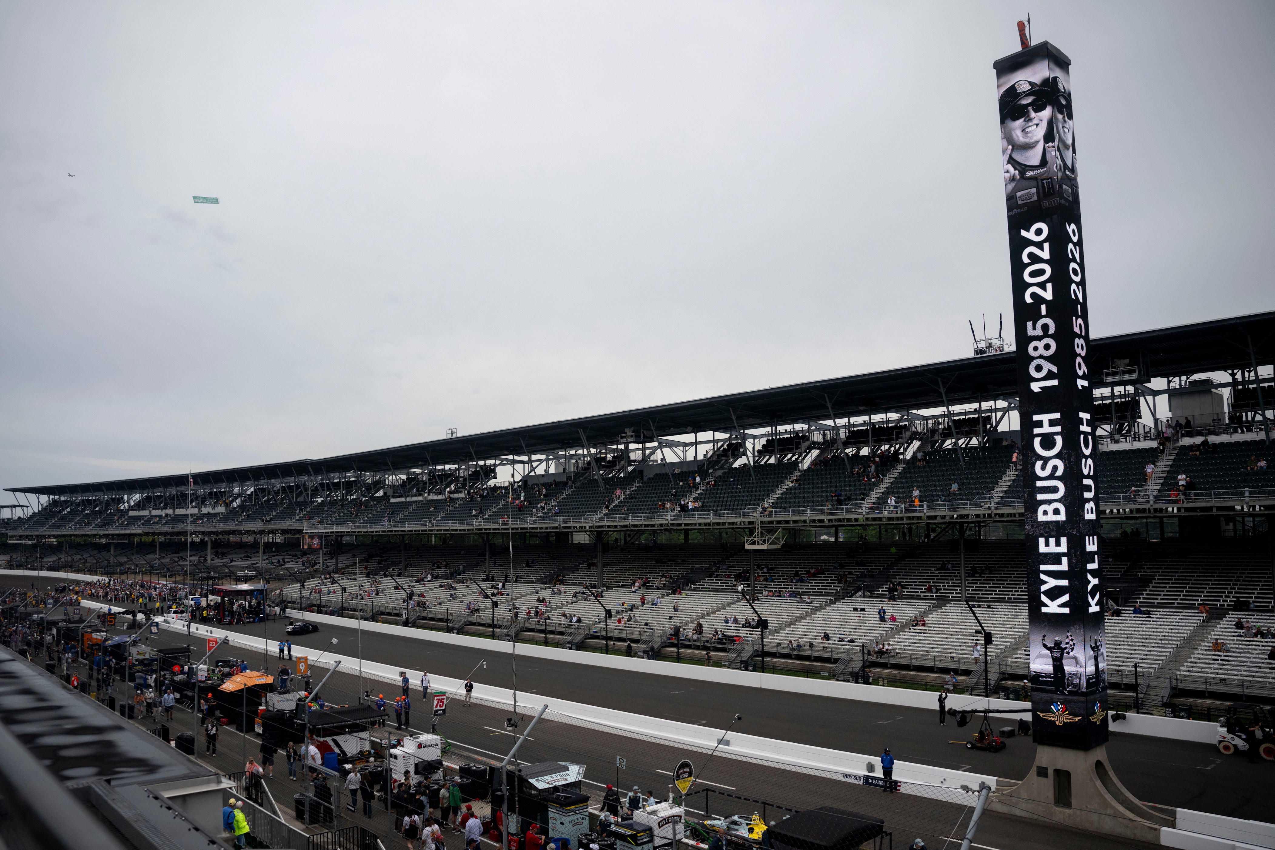 Kyle Busch is being honored at the Indy 500: pylon, No. 18 font, pit signs