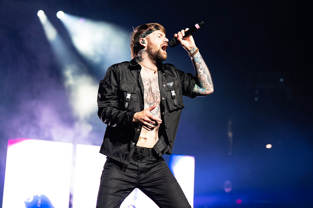 Inside the life and marriage of Beartooth frontman as he comes out as gay