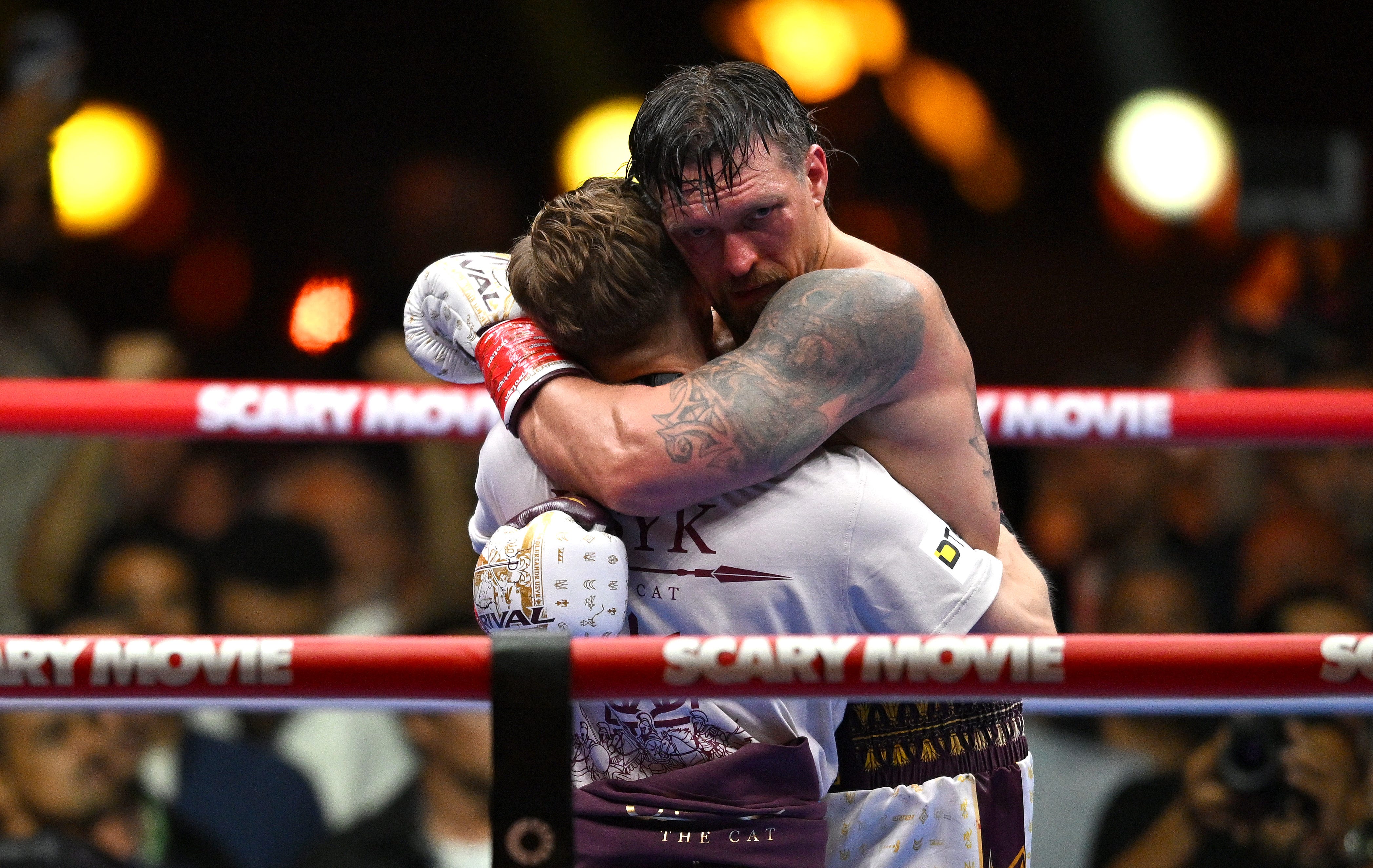 Oleksandr Usyk vacates world titles but says 'last dance' remains