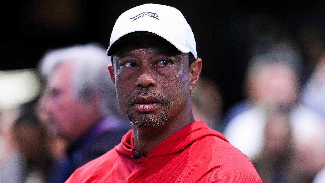 Tiger Woods returns to Switzerland following brief trip home