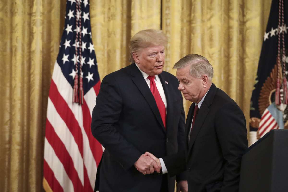President Donald Trump shakes hands with Sen Lindsey Graham during an event in the East Room of the White House on November 6, 2019, in Washington, DC (Drew Angerer/Getty Images)