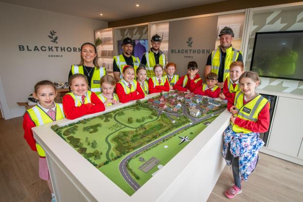 Primary school pupils visit site in their village to learn about ...