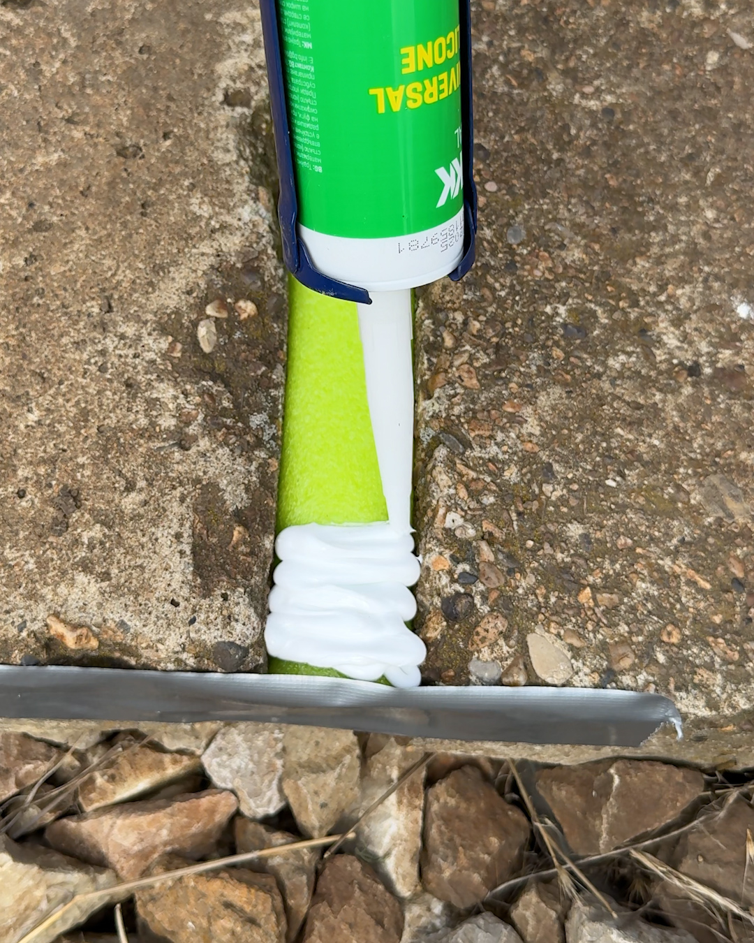 Sealing this road crack with a pool noodle