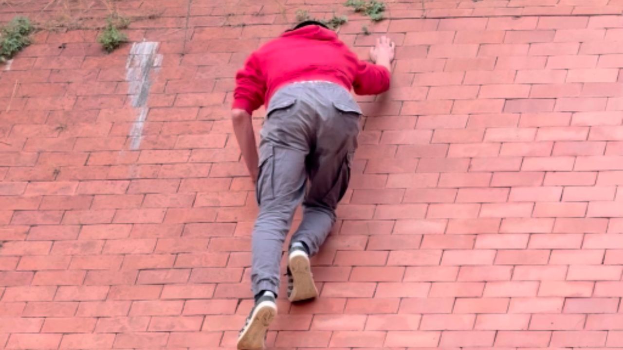 Runner loses traction and slips back to the bottom