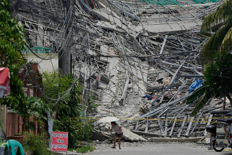 Photos show the aftermath of a building collapse in the Philippines
