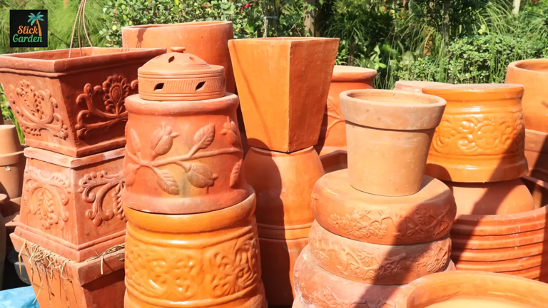 I started burying old terracotta pots in my garden and the soil ...