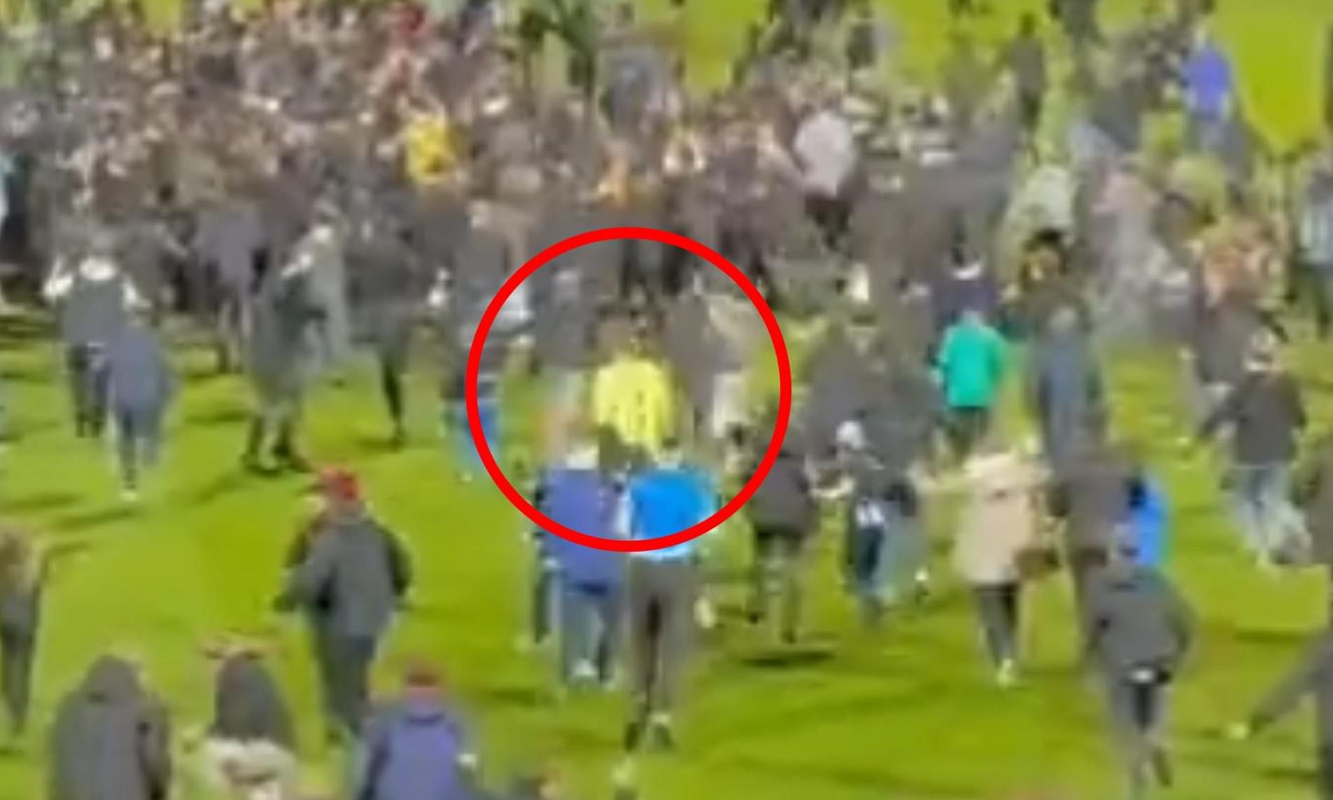 EFL goalkeeper tackled by fan during pitch invasion after Stockport's ...