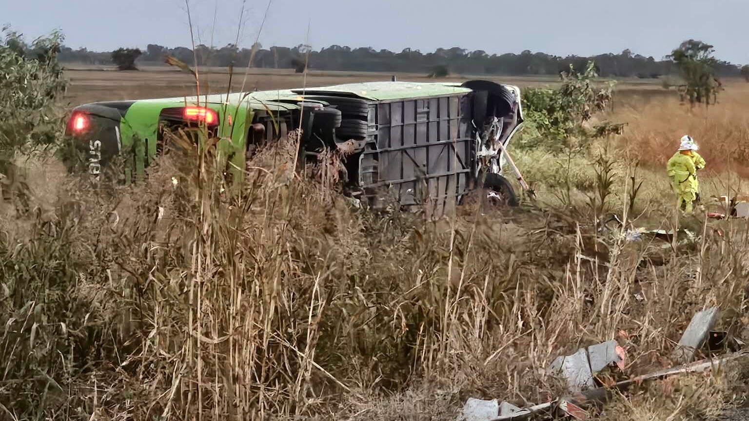 One dead and many injured after bus rollover on Queensland's Bruce ...