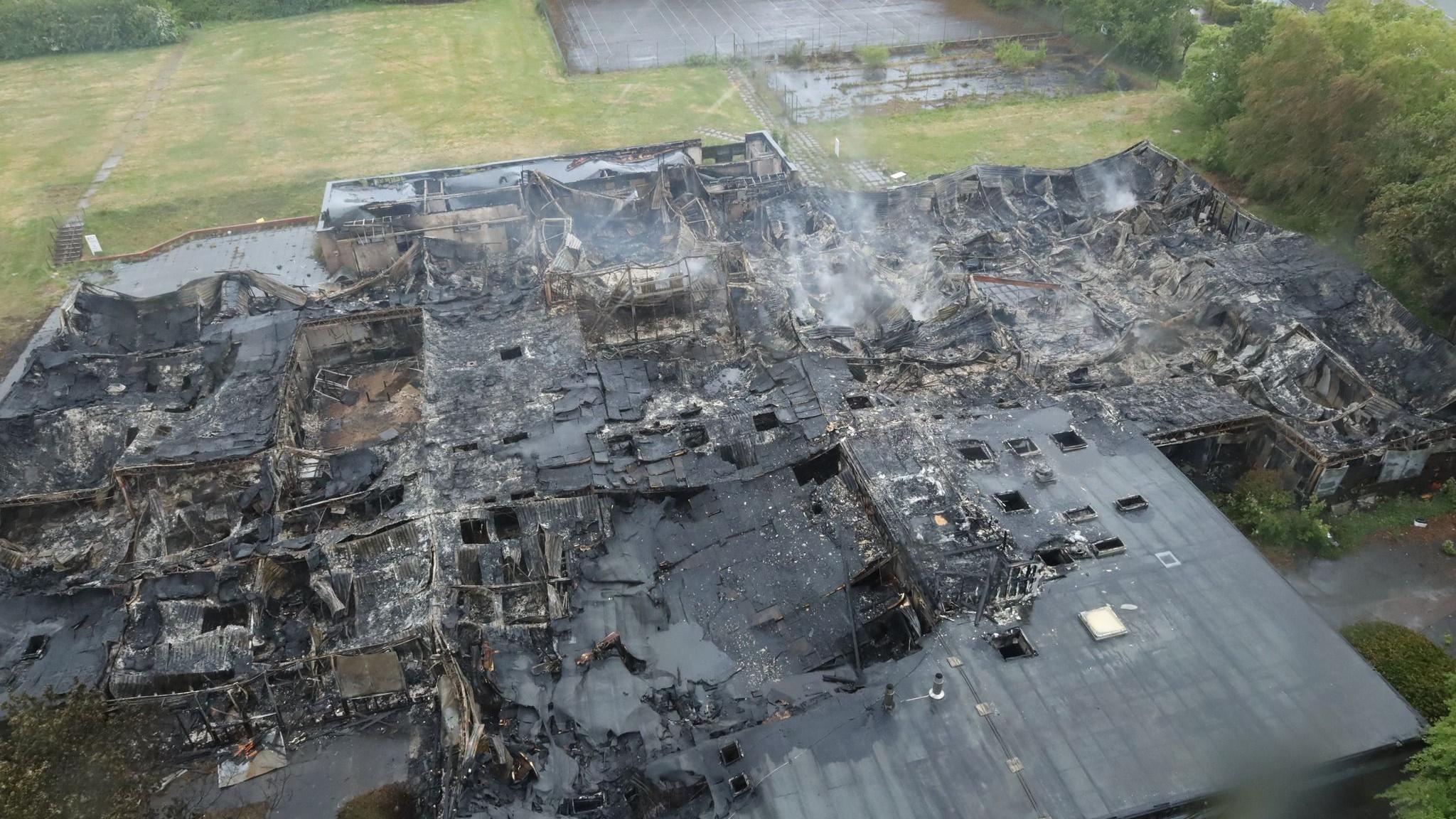 Two more teenagers arrested after school fire