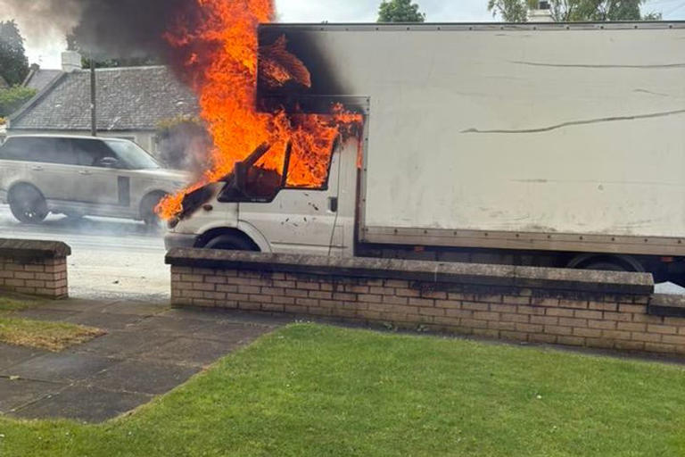 Dramatic footage shows van ravaged by flames as crews rush to scene