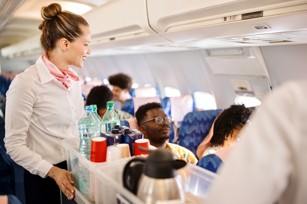 I’m a flight attendant — here’s why you shouldn’t use the tray table at all
