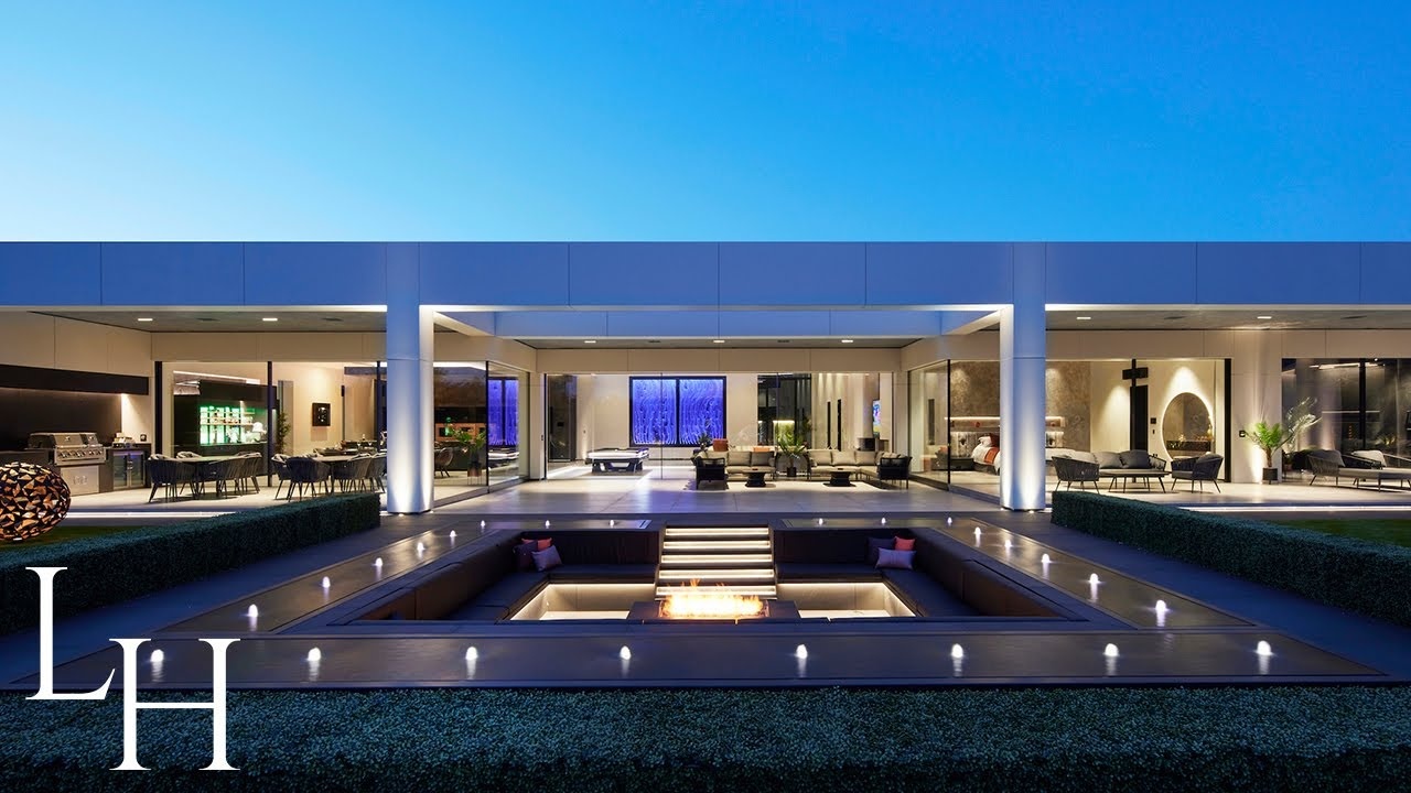 A $13M modern mansion with a 4-meter-tall front door and poolside gym