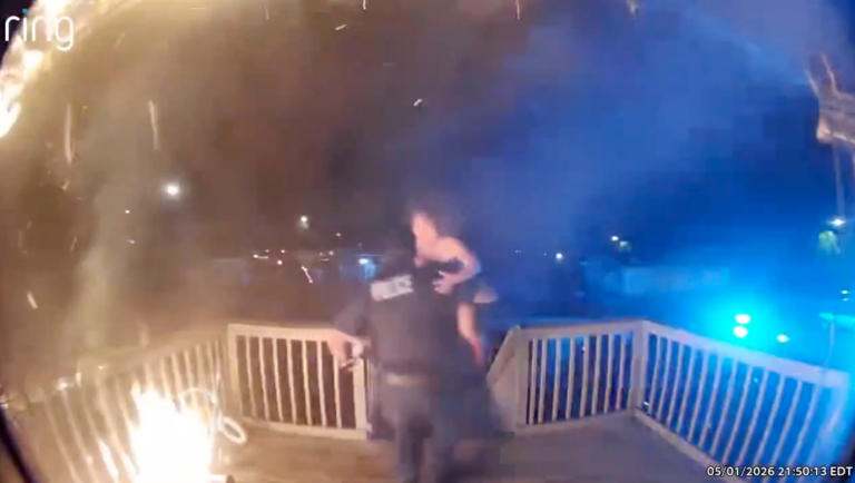 Watch: Hero cop saves entire family from burning home in heart-pounding ...