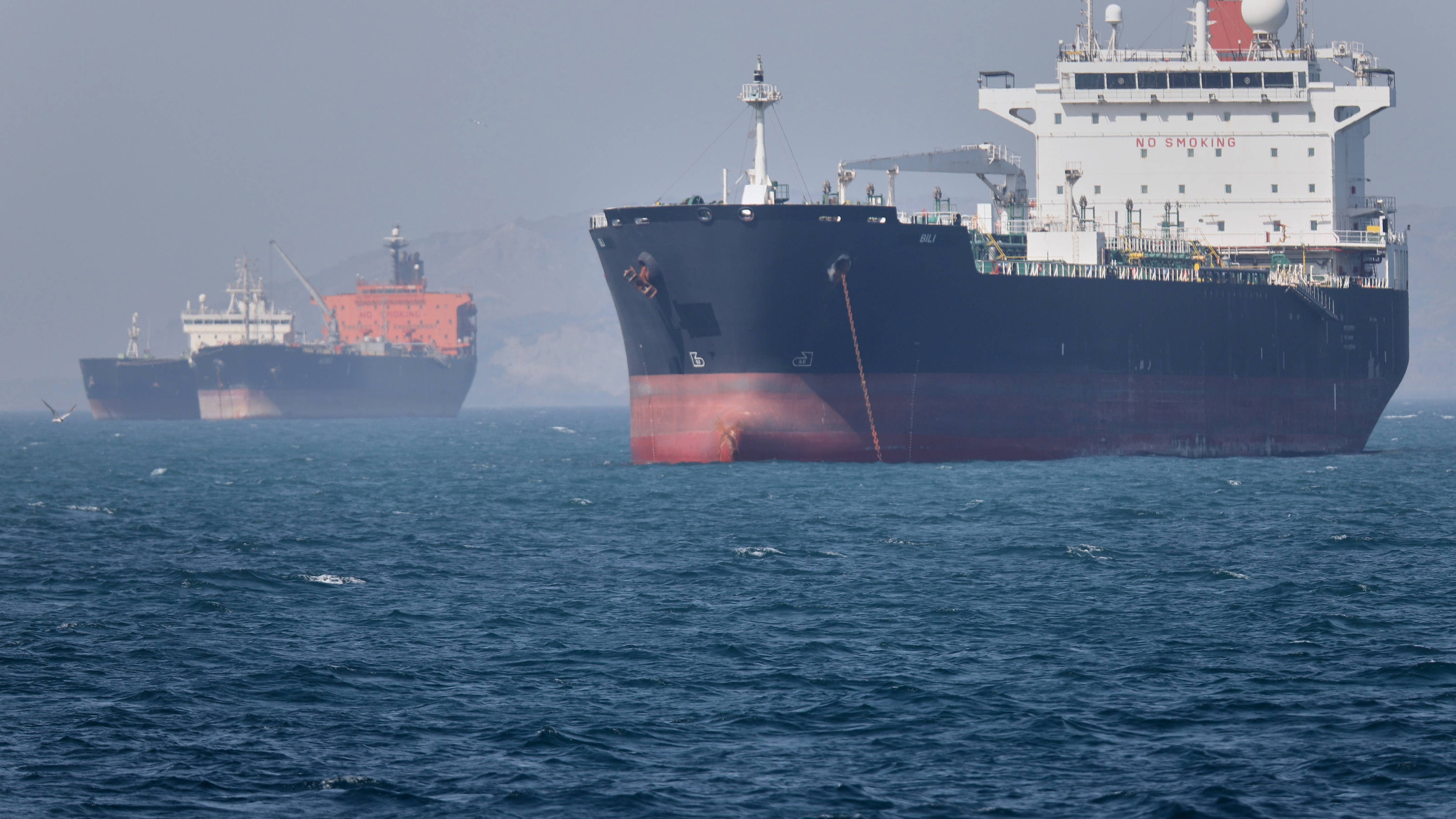 Tensions flare near Strait of Hormuz as ship is seized and another is sunk