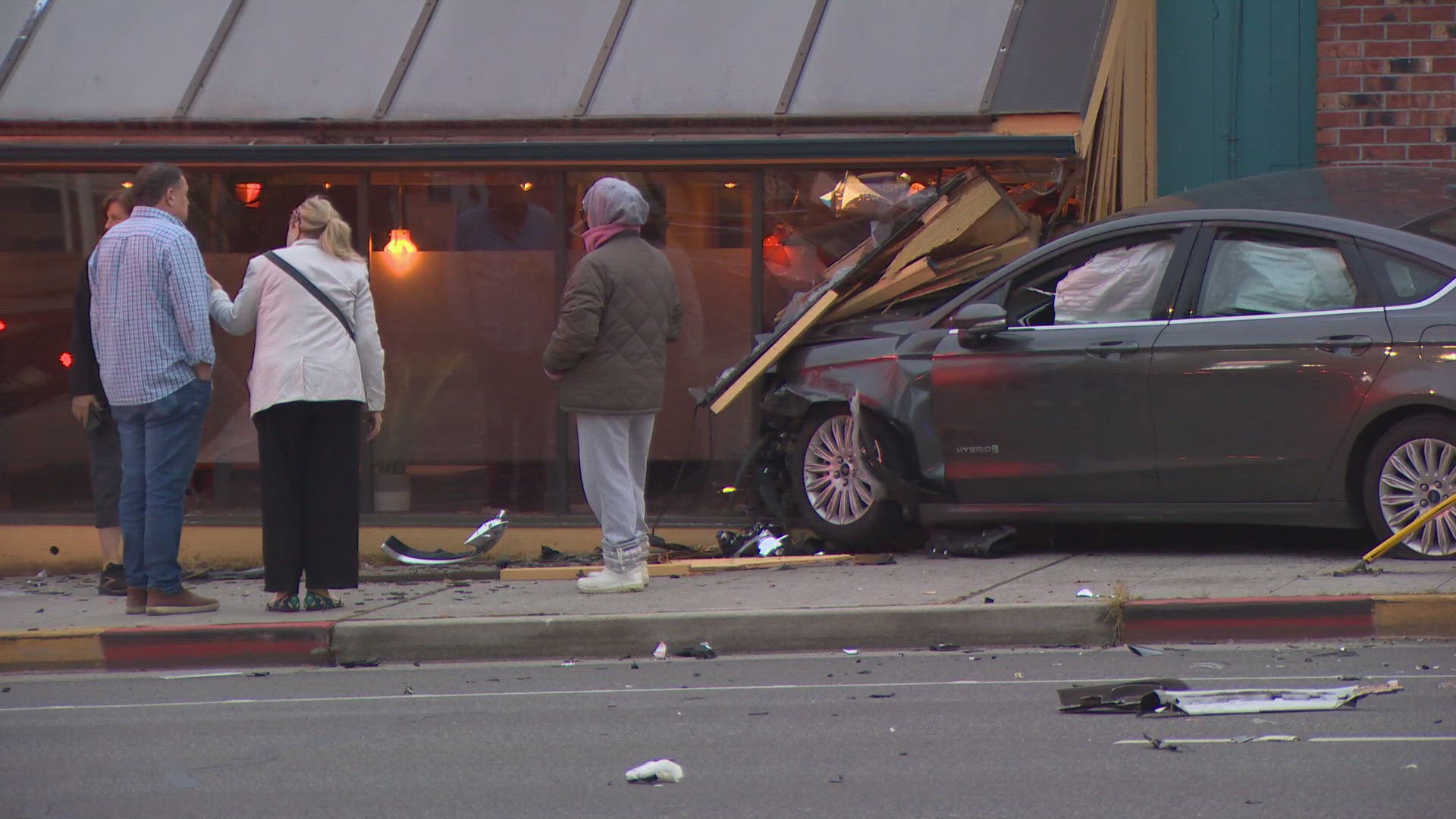 2 hurt after car crashes into Seattle restaurant