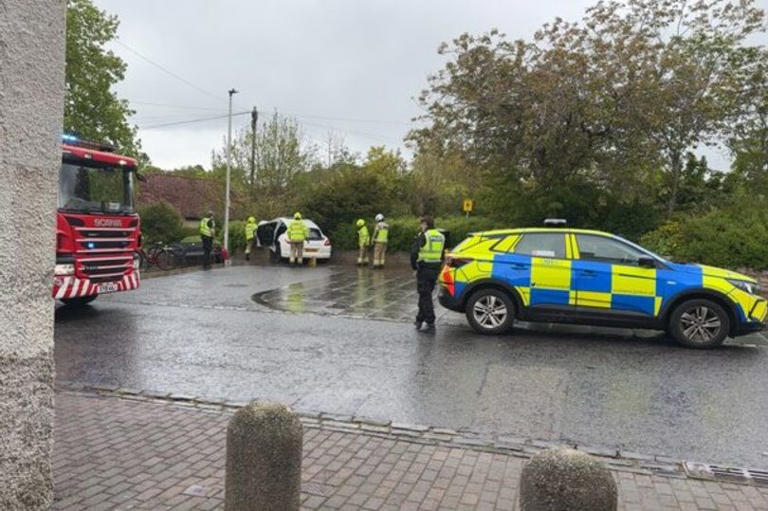 Huge Edinburgh emergency response on scene of incident as car mounts wall