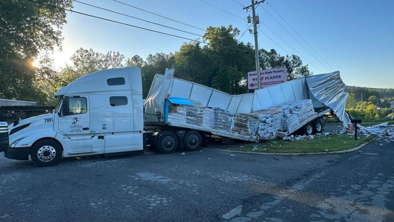 Tractor trailer spills White Claw cans and cargo after crash on Route 29